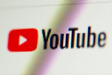 Close up shot of screen of device with YouTube logo. Watching YouTube concept. Chernihiv, Ukraine - 15 January 2022