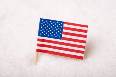 Flag of USA in sack of sugar. Concept of american sugar, export, import of product