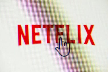 Screen of computer with Netflix logo and cursor of a mouse clicking to it, opening Netflix concept. Chernihiv, Ukraine - 15 January 2022