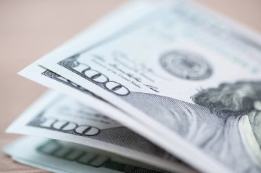 Macro picture of 100 US dollars, focus on numbers. Money of United States, close up shot, background