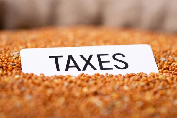 Papel Com Inscrição Impostos Sobre Grãos Painço Pagamento Impostos Para — Fotografia de Stock