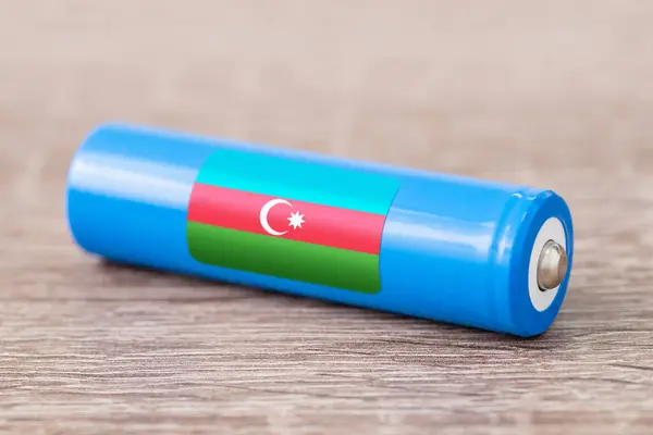 Rechargeable li-ion battery with flag of Azerbaijan. Production of lithium batteries in Azerbaijan
