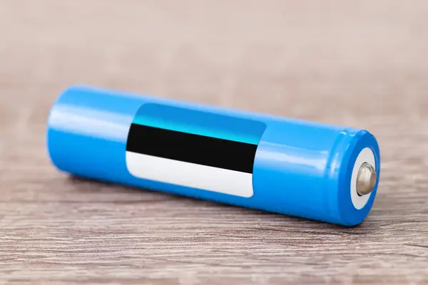 Rechargeable li-ion battery with flag of Estonia. Production of lithium batteries in Estonia