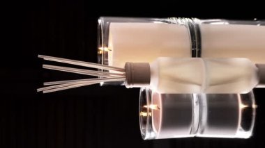 Aroma diffuser and scented candles that create coziness in the house. Romantic atmosphere. Details in the house that create coziness.
