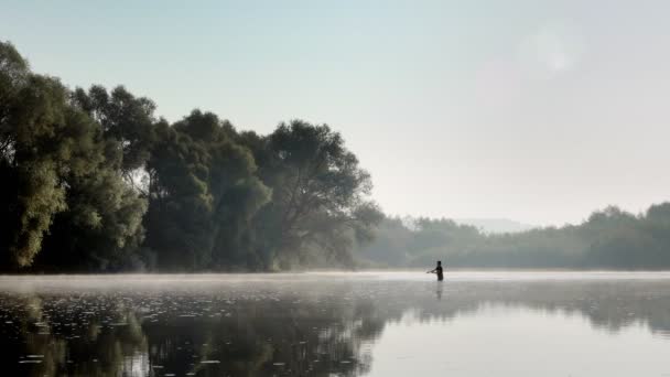 Fisherman Catching Fish River Foggy Summer Morning Fishing Spinning — Video Stock