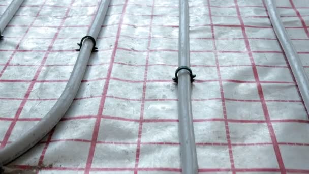 給湯用床暖房管の設置 暖房システム 床暖房用パイプ — ストック動画