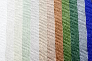 Renkli kumaş arka plan. Yoğun kumaşın renk çeşitliliği. Renk paleti.