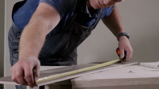 Professional Tiler Measuring Sticking Tape Cutting Ceramic Tiles Installing Floor — Stock Video