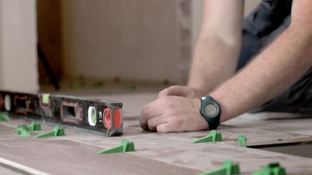 Hands Tiler Laying Ceramic Tile Floor — Stock Video