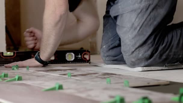 Tiler Placing Ceramic Wall Tile Position Adhesive Lash Tile Leveling — Stock Video