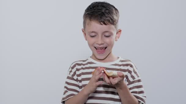 Little Boy Deliciously Eating Salami Pizza Grey Background — Stock Video