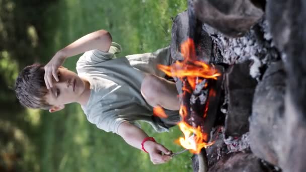 Little Boy Sitting Bonfire Grilling Marshmallow Stick Dropping — Stock Video