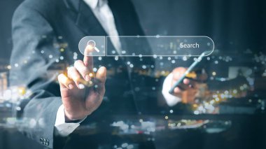 Businessman use smart phone Search On Virtual Screen Data Search Technology Search Engine Optimization. Searching for information. Using Search Console for data, info.