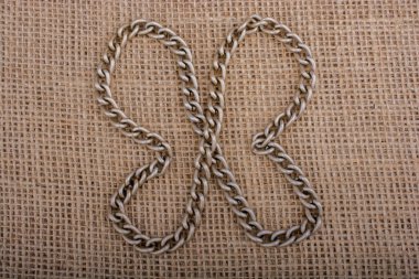 zincir formes bir kelebek keten bir tuval üzerine rakam