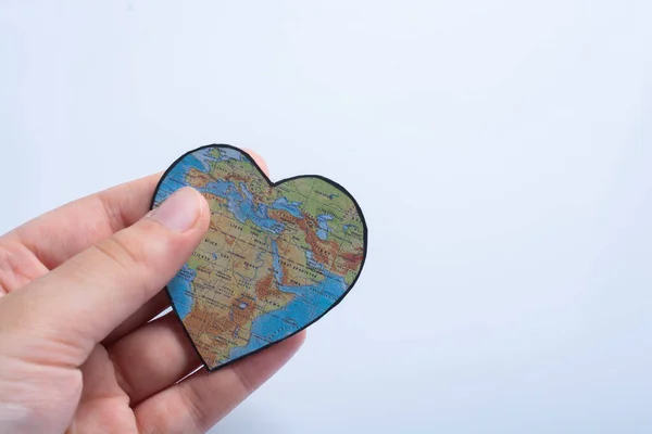 heart shaped object with map of Africa as valentine concept in hand