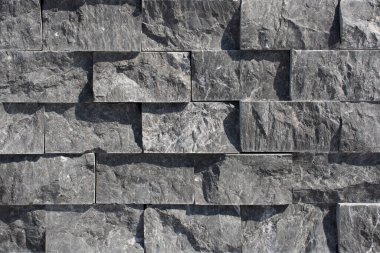 Arkaplan dokusu olarak dekoratif küp taş duvar