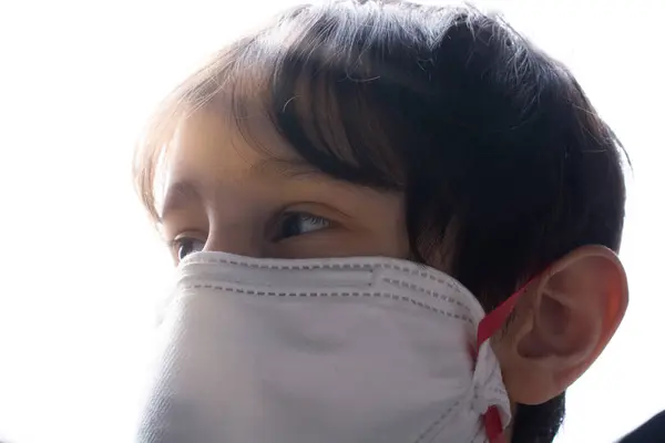 Kid wear health masks to prevent virus and germs. Disease  protection