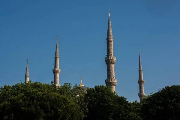 Minarets of Muslim mosque Religion, islam, tourism and travel concepts