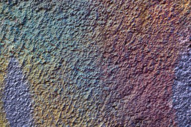 Soyut arkaplan dokusu olarak çeşitli renklere boyanmış duvar yüzeyi