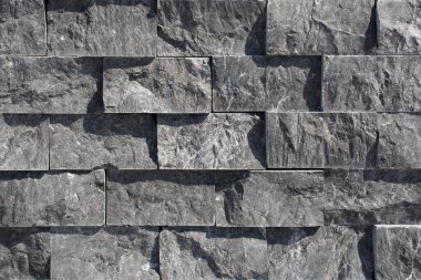 Arkaplan dokusu olarak dekoratif küp taş duvar