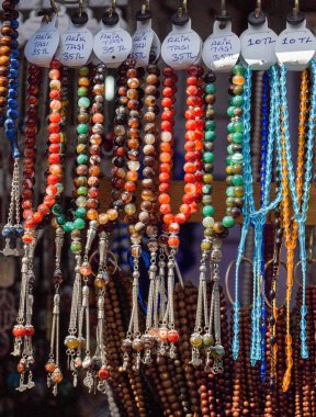 Set of praying beads of various colors clipart
