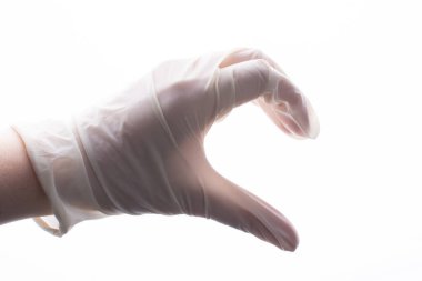 Koruyucu steril eldiven. Elindeki eldiven. Coronavirus COVID-19 salgın konsepti