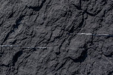 Arka plan dokusu olarak doğal kaya veya taş yüzeyi