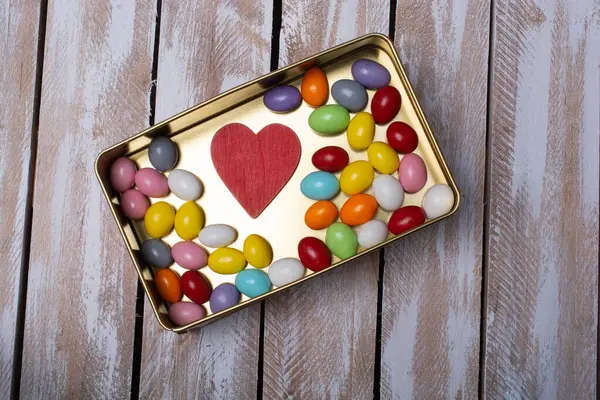 Stock image Large variety of sweets and candies and a heart