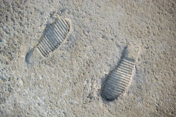 stock image Footstep pattern seen on a concrete background