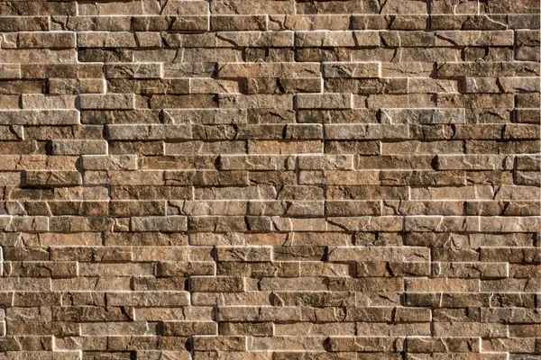 Taş duvar yüzeyi basit arka plan doku desen olarak