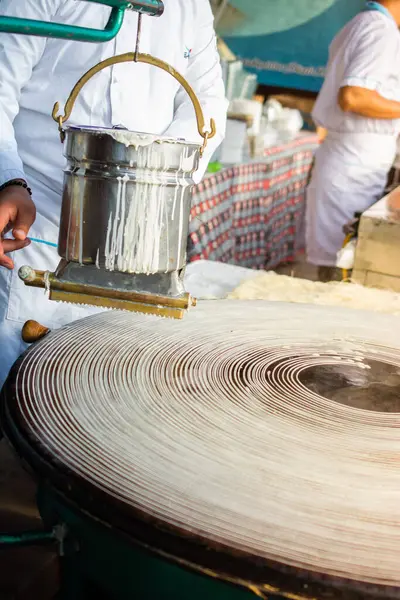 stock image The making of Turkish desert Kadayif pastry in display