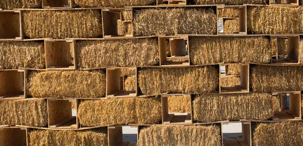 stock image Harvesting in agriculture bales of hay are stacked in large stacks