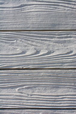 Texture details of an old wooden plunks as background clipart