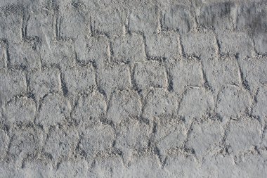 Yeni dökülmüş beton yüzeydeki desenler