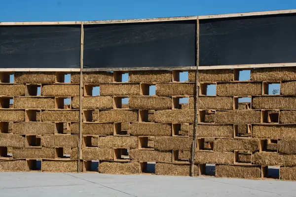 stock image Harvesting in agriculture bales of hay are stacked in large stacks