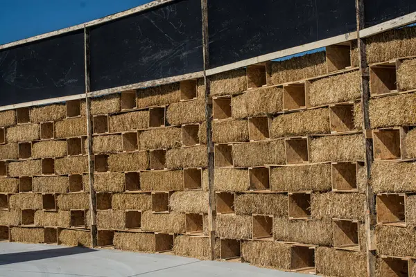 Stock image Harvesting in agriculture bales of hay are stacked in large stacks