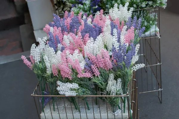 stock image Plastic unreal fake flowers colourful flowers