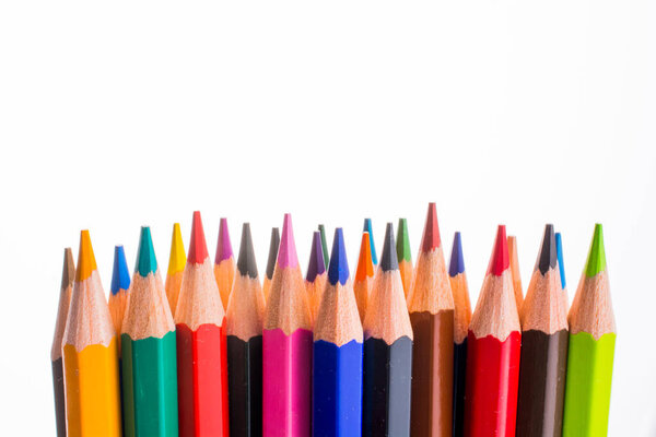 Color pencils of various color on a white background
