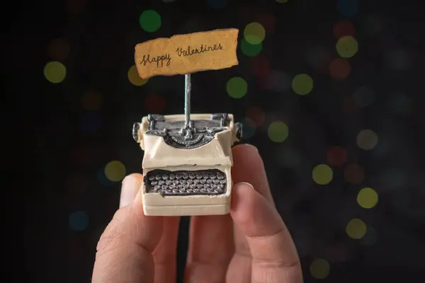 stock image Valentine's day wording on torn  typewriter as Love concept