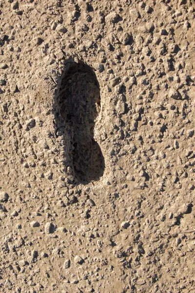 Stock image Footstep pattern seen on a concrete background