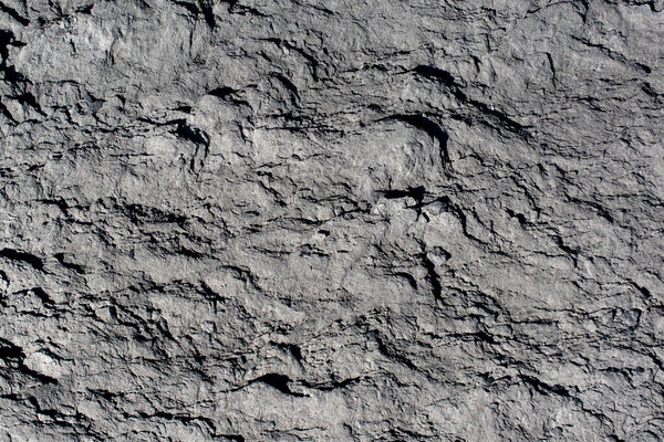 Естественная поверхность породы или камня в качестве фоновой текстуры