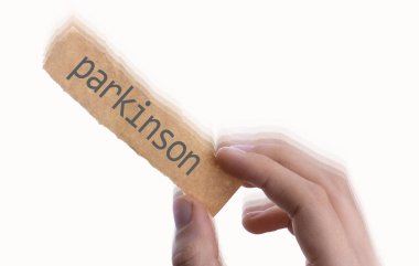 Parkinson hastalığı beyaz arkaplan üzerine yazılı.