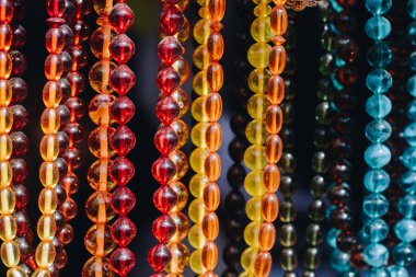 Set of praying beads of various colors clipart