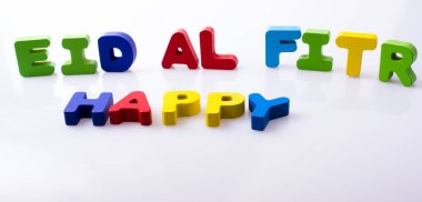 the word EID EL FITR  written with colorful letter blocks clipart