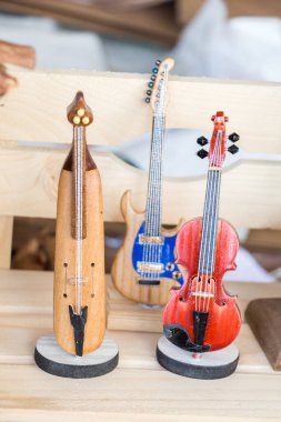 Set of  models of musical instruments made of wood clipart