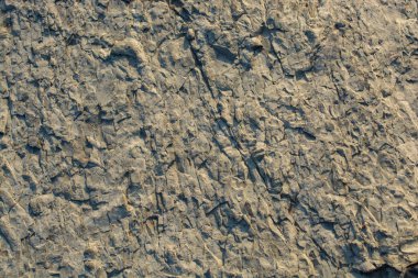 Arka plan dokusu olarak doğal kaya veya taş yüzeyi