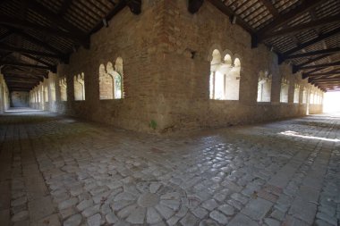 Fossacesia - Abruzzo - Medieval Church of San Giovanni in Venere: The ancient cloister of the abbey with the adjoining garden