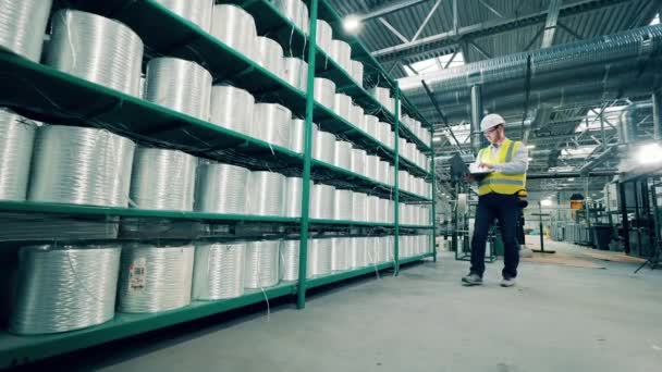 Factory Worker Doing Inventory Fiberglass Rolls — Stok video