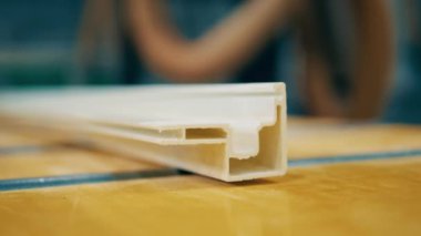 Newly-produced fiberglass frame is moving along the surface. 4K