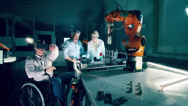 Disabled Engineer Glasses Operating Robotic Arm — Vídeos de Stock